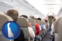 delaware map icon and airline passengers in a commercial jetliner