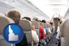 idaho map icon and airline passengers in a commercial jetliner