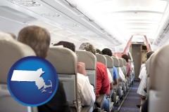 massachusetts map icon and airline passengers in a commercial jetliner