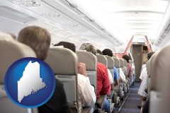 maine map icon and airline passengers in a commercial jetliner