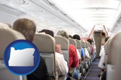 oregon map icon and airline passengers in a commercial jetliner