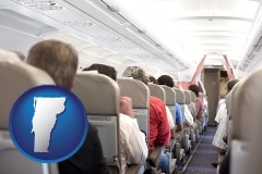 vermont map icon and airline passengers in a commercial jetliner