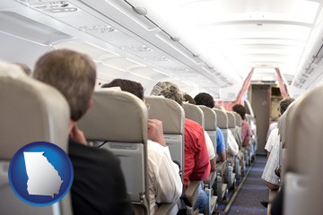 airline passengers in a commercial jetliner - with Georgia icon