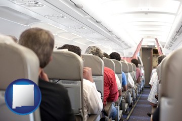 airline passengers in a commercial jetliner - with New Mexico icon