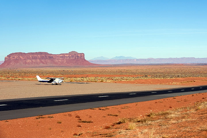 small airplane and landing strip at Monument Valley, Arizona